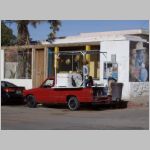 A mexican man selling coconuts from his truck in Rocky Point (Puerto Penasco) in Mexico. Can you find the TELMEX pay-phone? 2010 (961.02 KB)